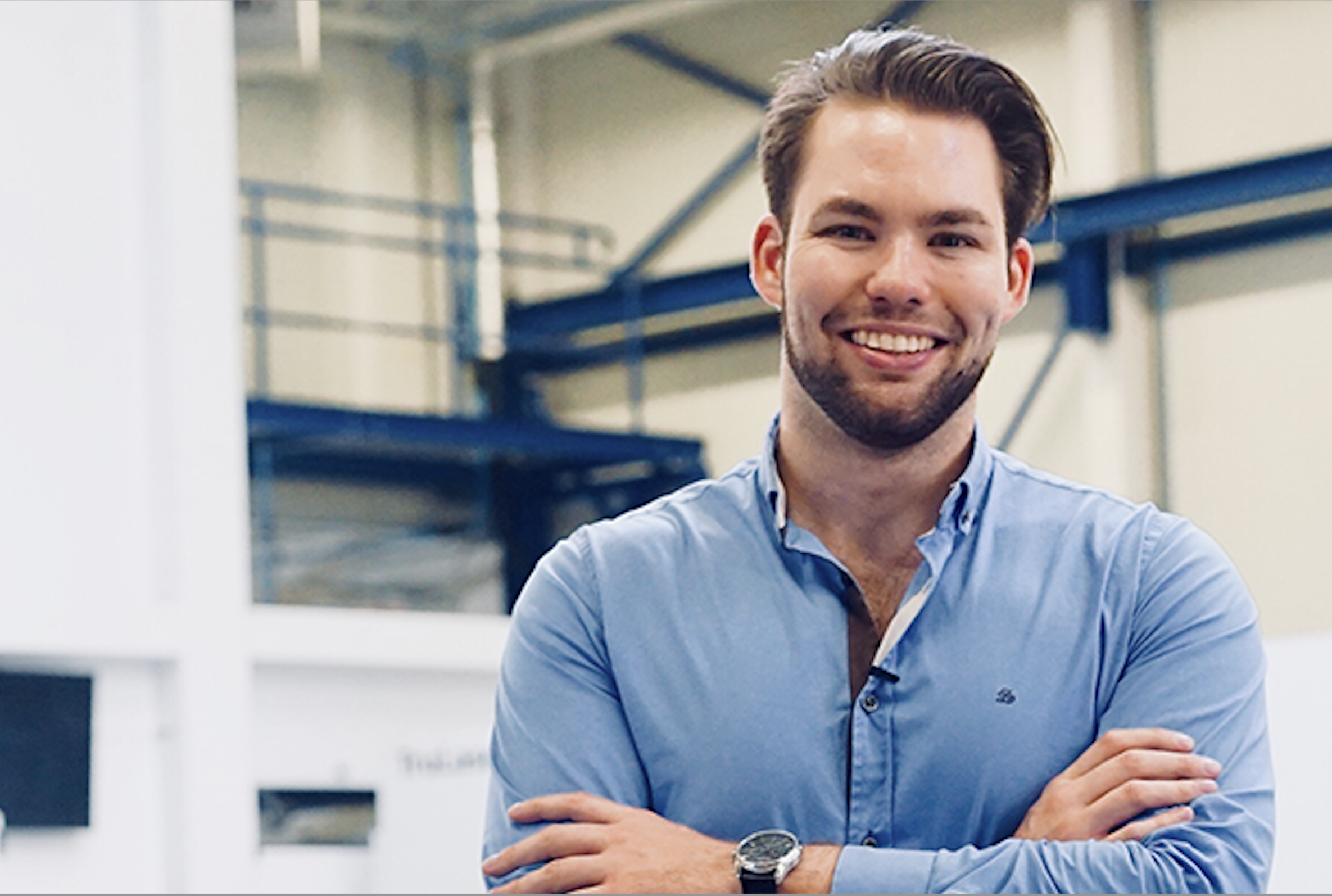 Luke van Enkhuizen on the shop floor with manufacturing equipment